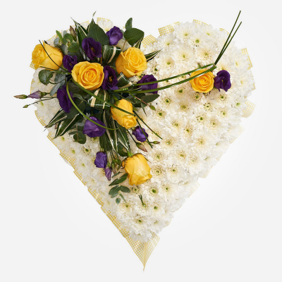 Heart SYM-324 - White Massed Heart with Yellow & Purple Spray. A beautiful arrangement to send to a funeral.
